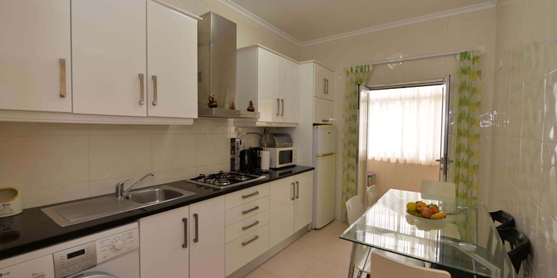 Nazare Holiday Apartment Coastal Haven Kitchen With Dining Table And 6 Chairs