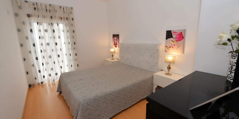 Nazare Holiday Apartment Coastal Haven Queen Bedroom With Queen Bed And Balcony