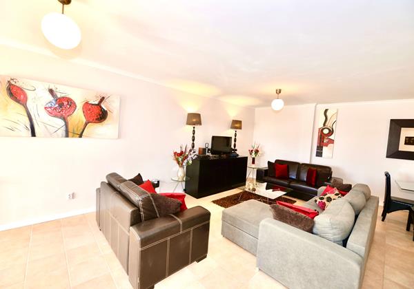 Palm Tree Apartment Living Area With Free Wifi