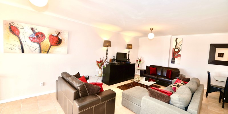Palm Tree Apartment Living Area With Free Wifi