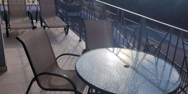 Seascape Apartment Balcony With Dining Area And Sunloungers Cyprus
