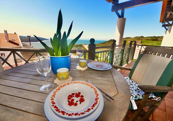 Outdoor Dining Area With View Over The Sea And Pool In Holiday Apartment In Gilmafacho Sao Martinho Do Porto Portugal