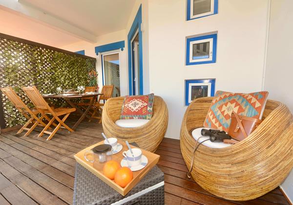 Outdoor Lounging Area Facing The Ocean In Holiday Rental In Sao Martinho Do Porto Portugal