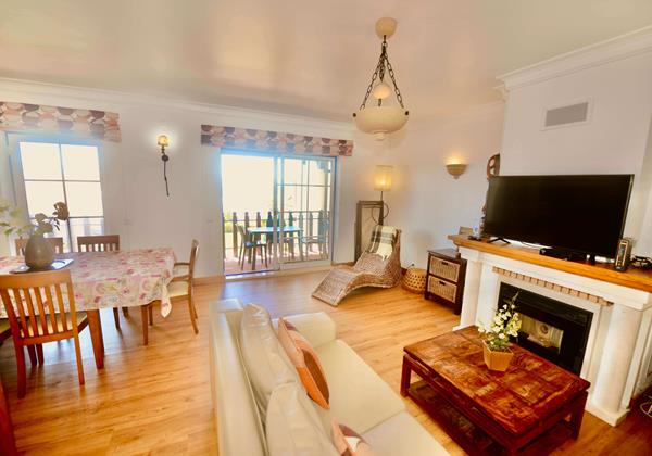 Spacious Living Area With Lounge Dining Area And Access To Balcony In Ship Apartment For Holiday Rentals In Sao Martinho Do Porto Silver Coast Portugal
