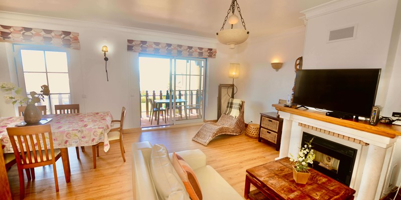 Spacious Living Area With Lounge Dining Area And Access To Balcony In Ship Apartment For Holiday Rentals In Sao Martinho Do Porto Silver Coast Portugal