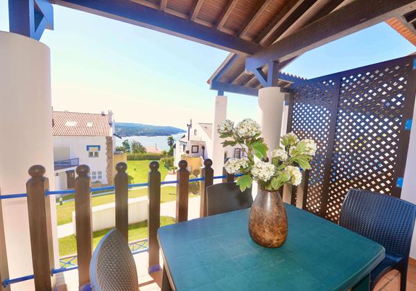Balcony With Dining Area And View Over The Sea In Ship Apartment For Holiday Rentals In Sao Martinho Do Porto Silver Coast Portugal
