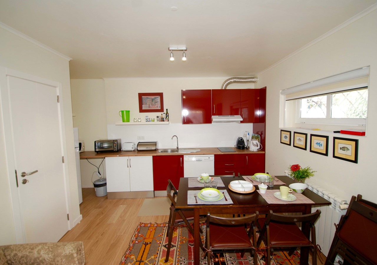 Dining And Kitchen Area In First Lounge