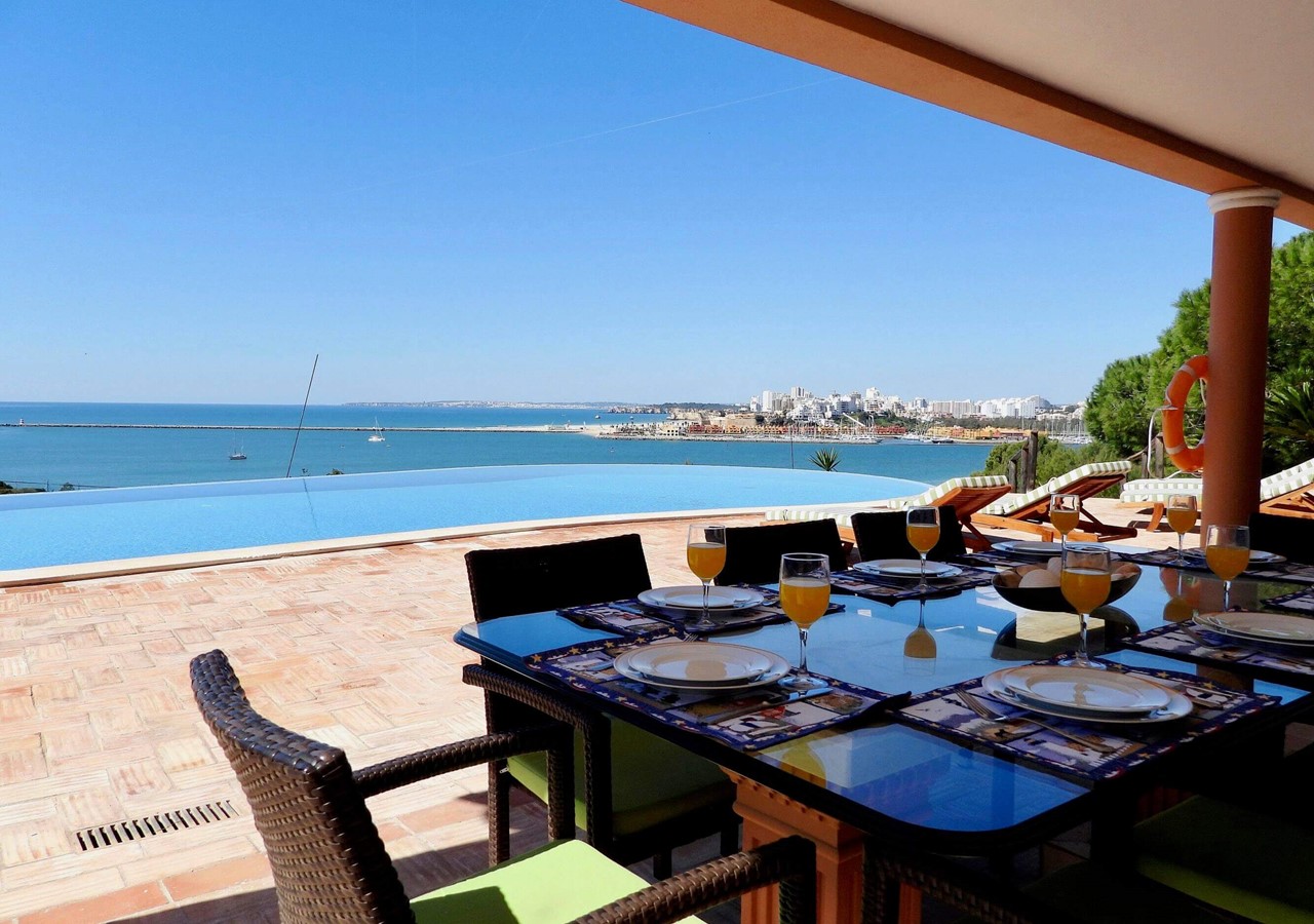 Dining area facing the pool