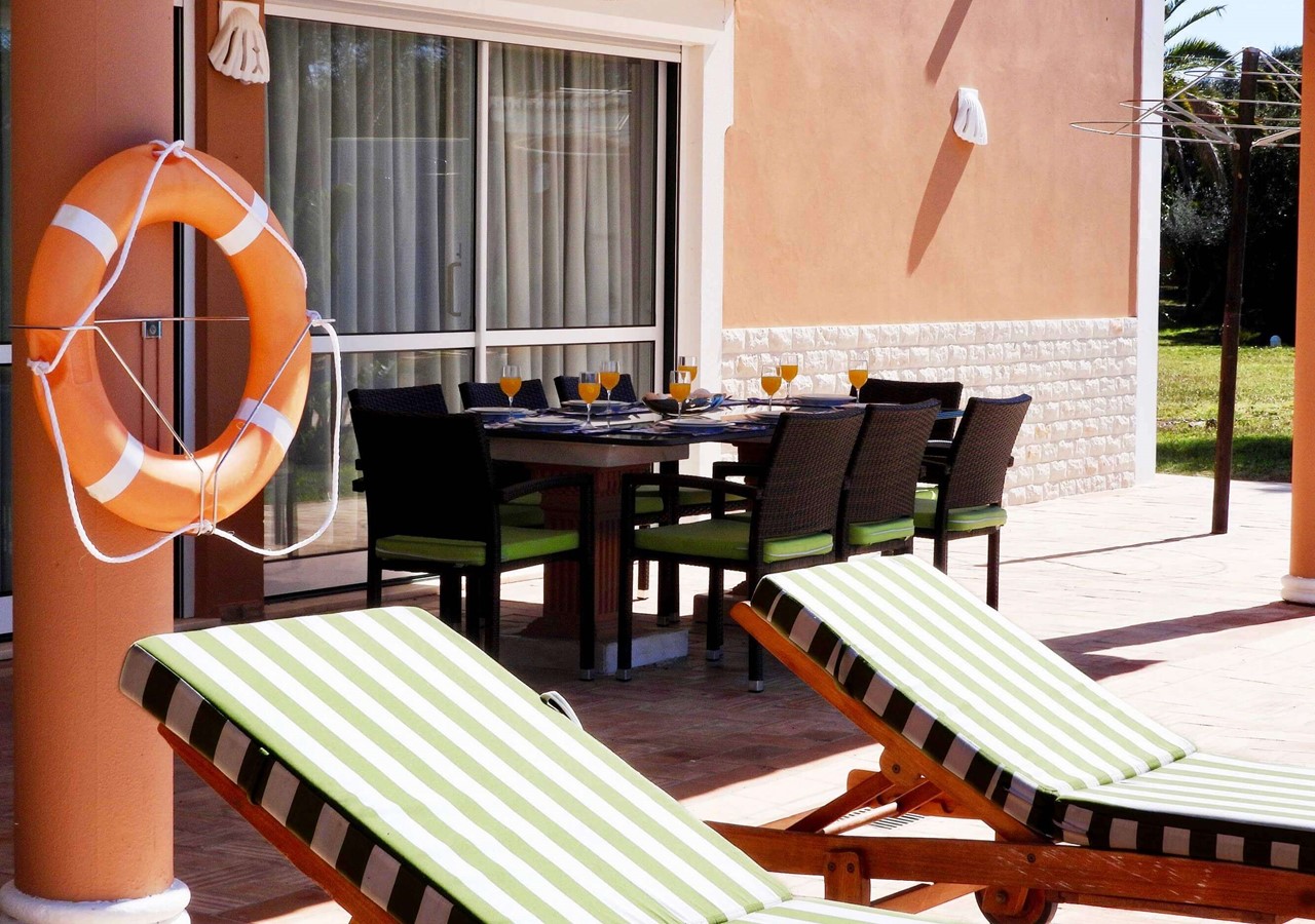 Sun loungers around the pool