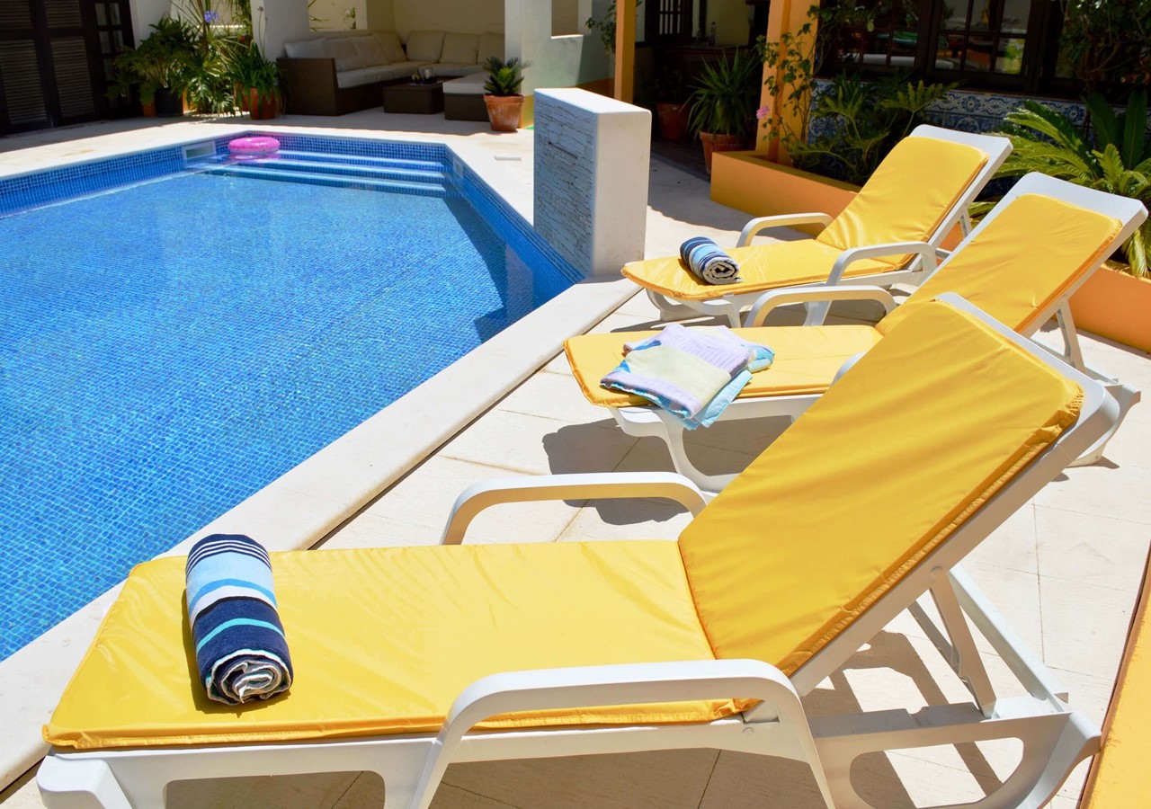 Sun Loungers Around The Pool