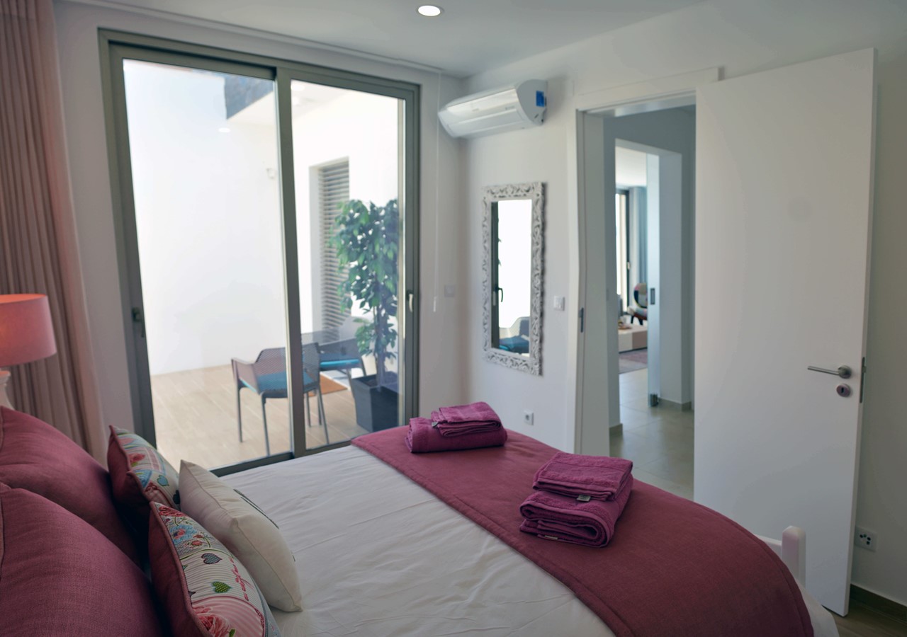 Master Bedroom With Balcony