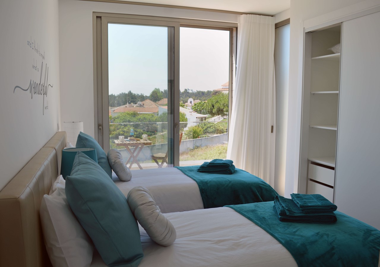 Twin Bedroom With Balcony