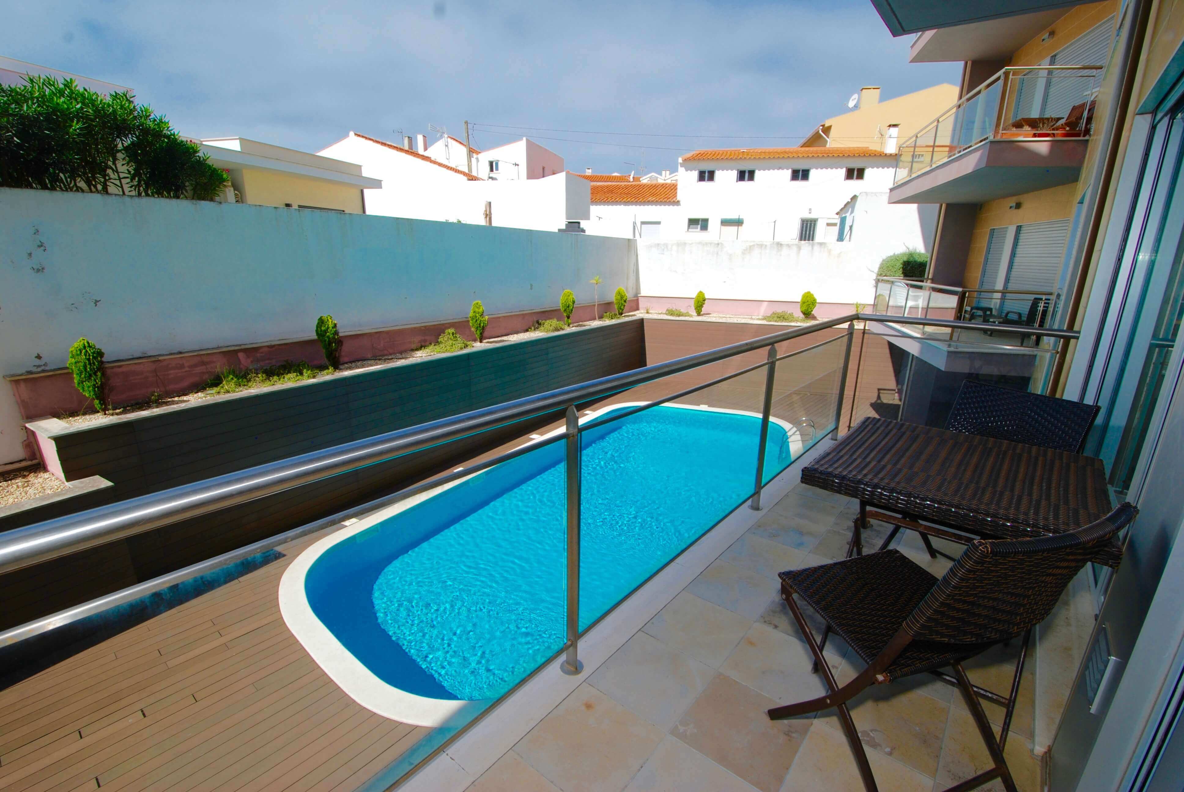 Balcony With View Over Pool
