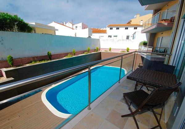 Balcony With View Over Pool