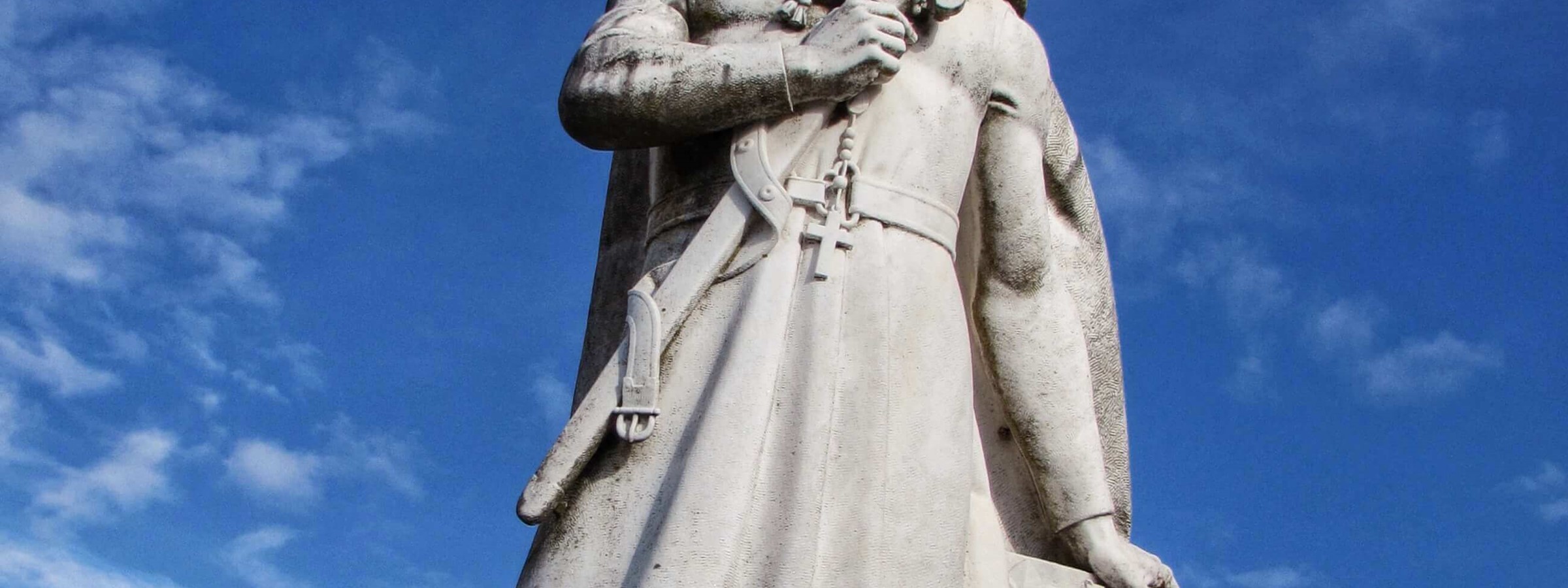 Many Bars Located Near Infante Santo Statue