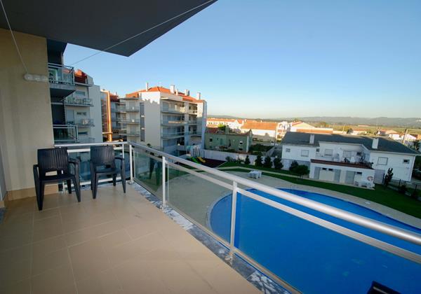 Balcony with view over the pool