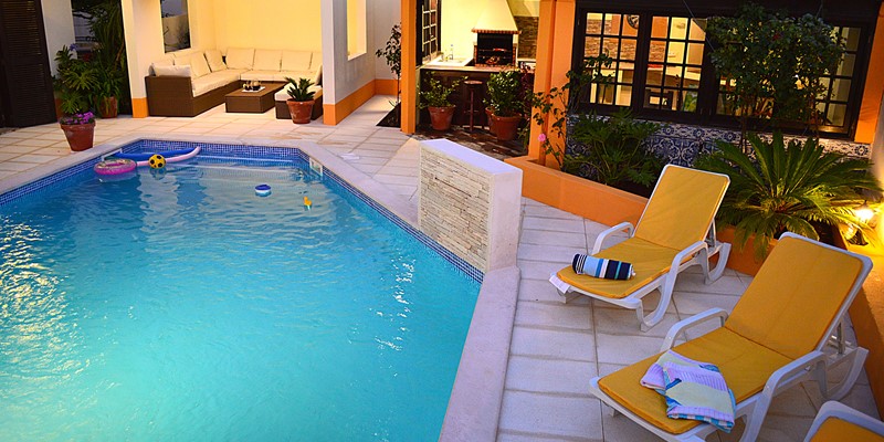 Pool area with sun loungers