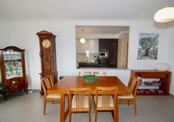 Dining Area In Blue Sky Apartment