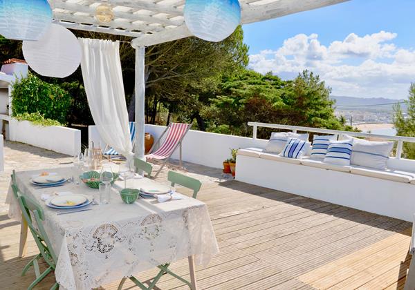 Outside Dining And Lounging Area In Holiday Villa